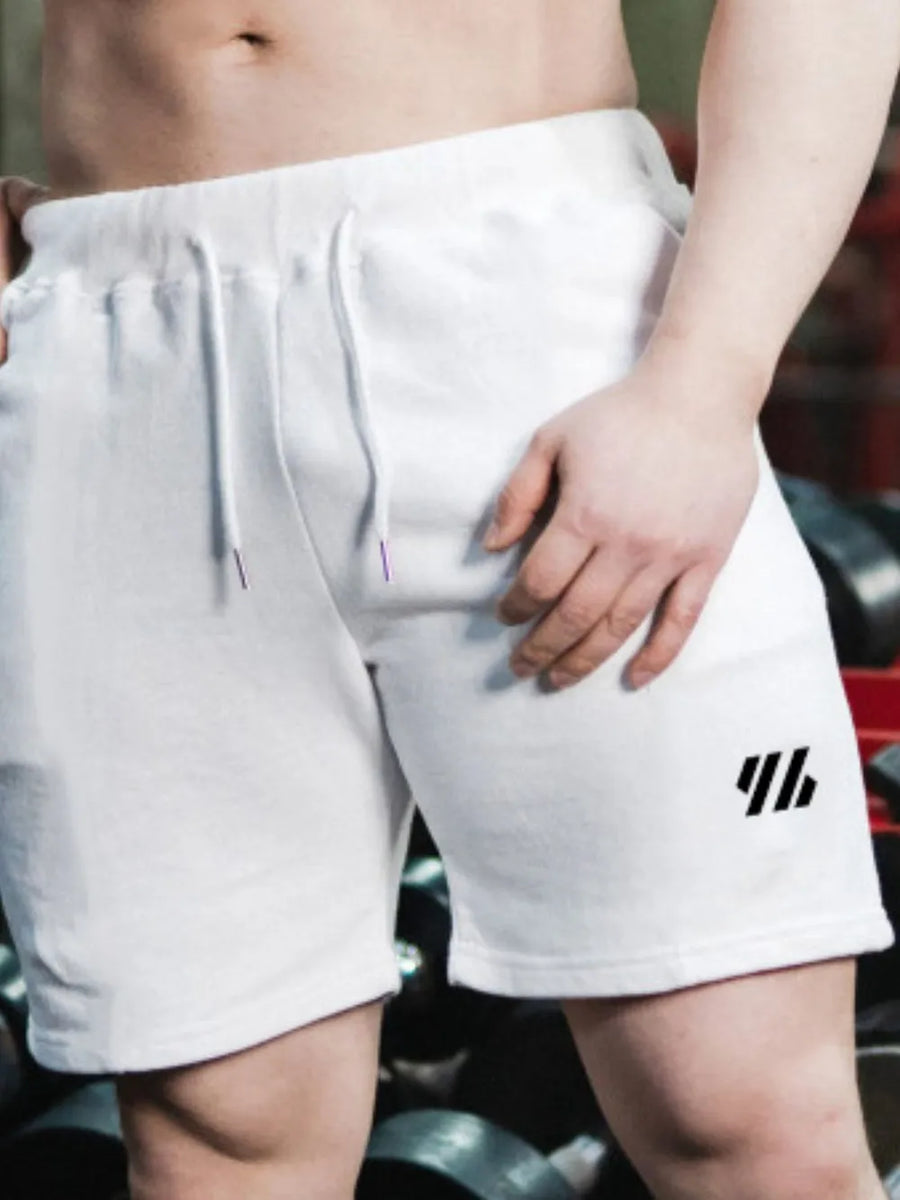 White athletic shorts with drawstring and logo detail