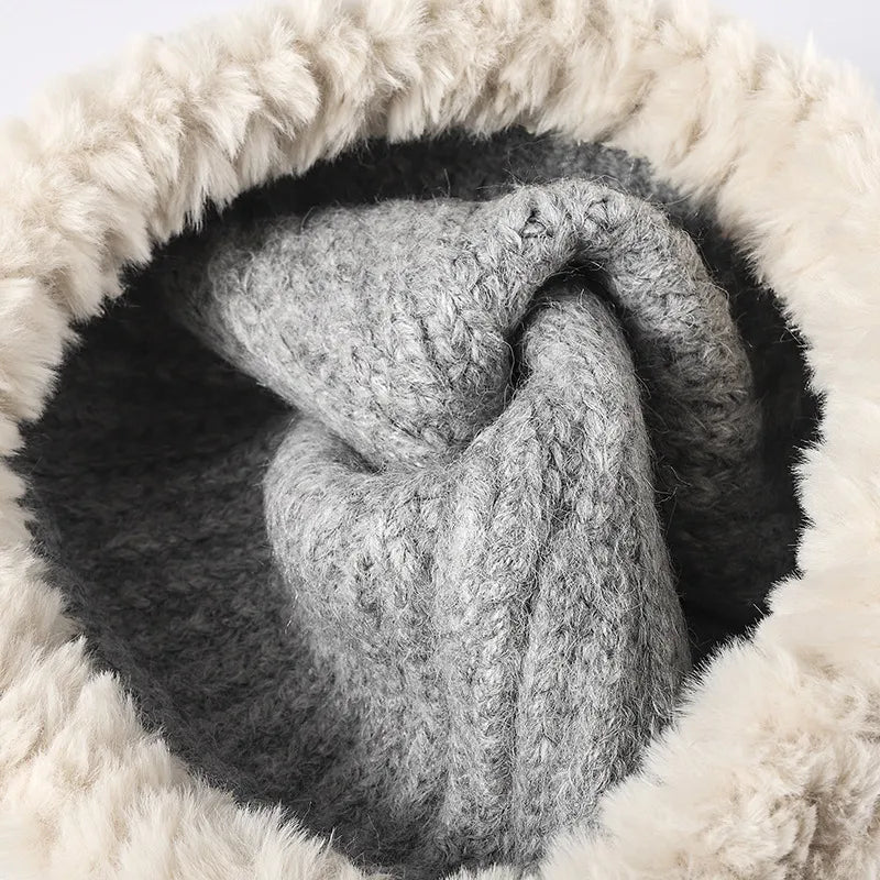 Ribbed knit beanie in light gray with a fluffy faux fur trim lining.