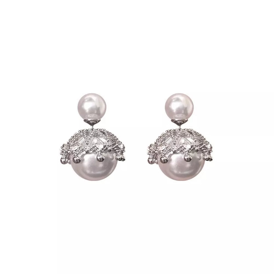 Pearl stud earrings with crown-inspired crystal embellishments and dangling pearls.