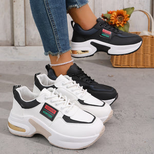 Trendy round toe lace-up sneakers in gray/white and black with chunky soles and gold accents.