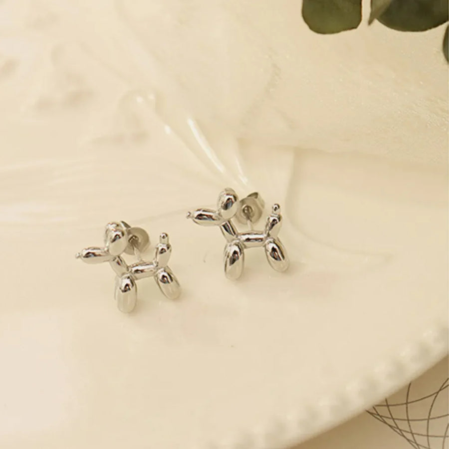 Silver balloon dog sculptural stud earrings with post backs.