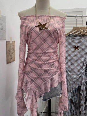 Pink plaid off-the-shoulder maternity overshirt with asymmetrical ruffle hem and star cutout detail.