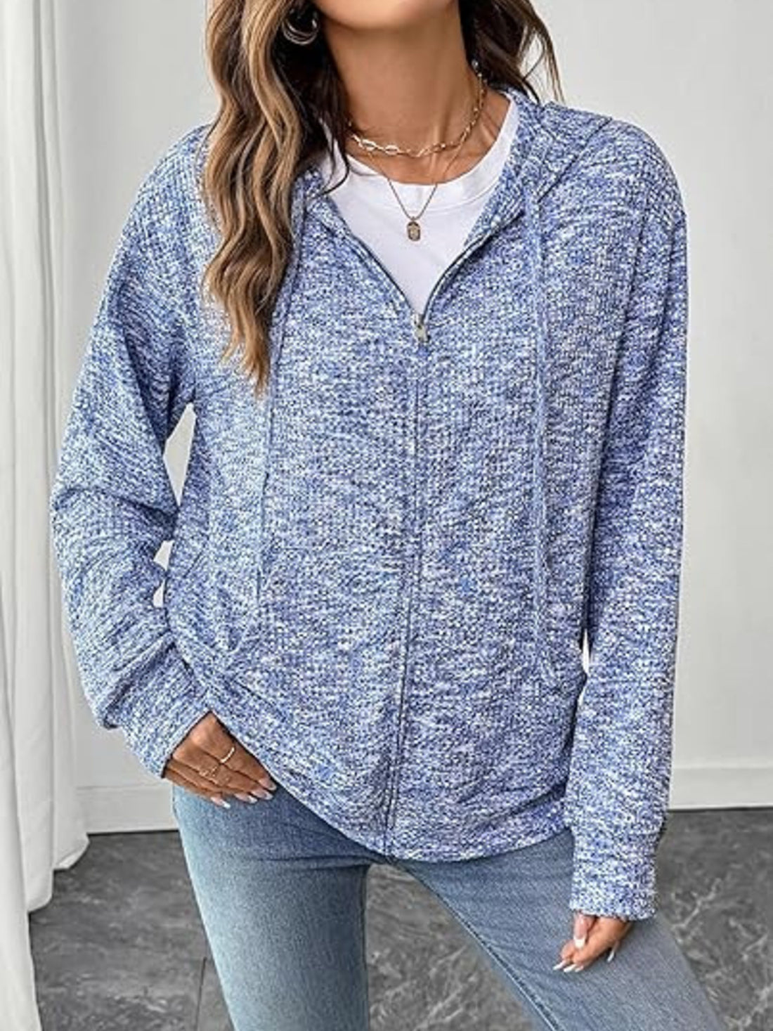 zip hoodie in light blue featuring drawstring and relaxed fit