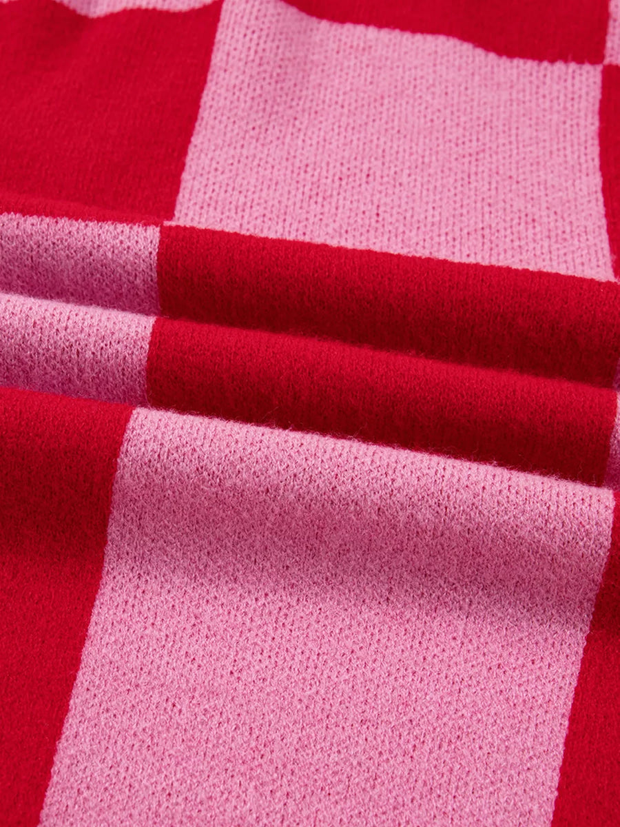 Checkerboard knit cardigan in deep rose and pink with a textured weave.