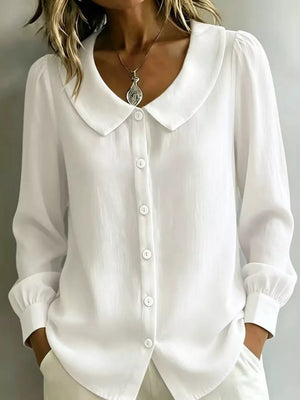 button-down shirt in white featuring buttoned and relaxed fit