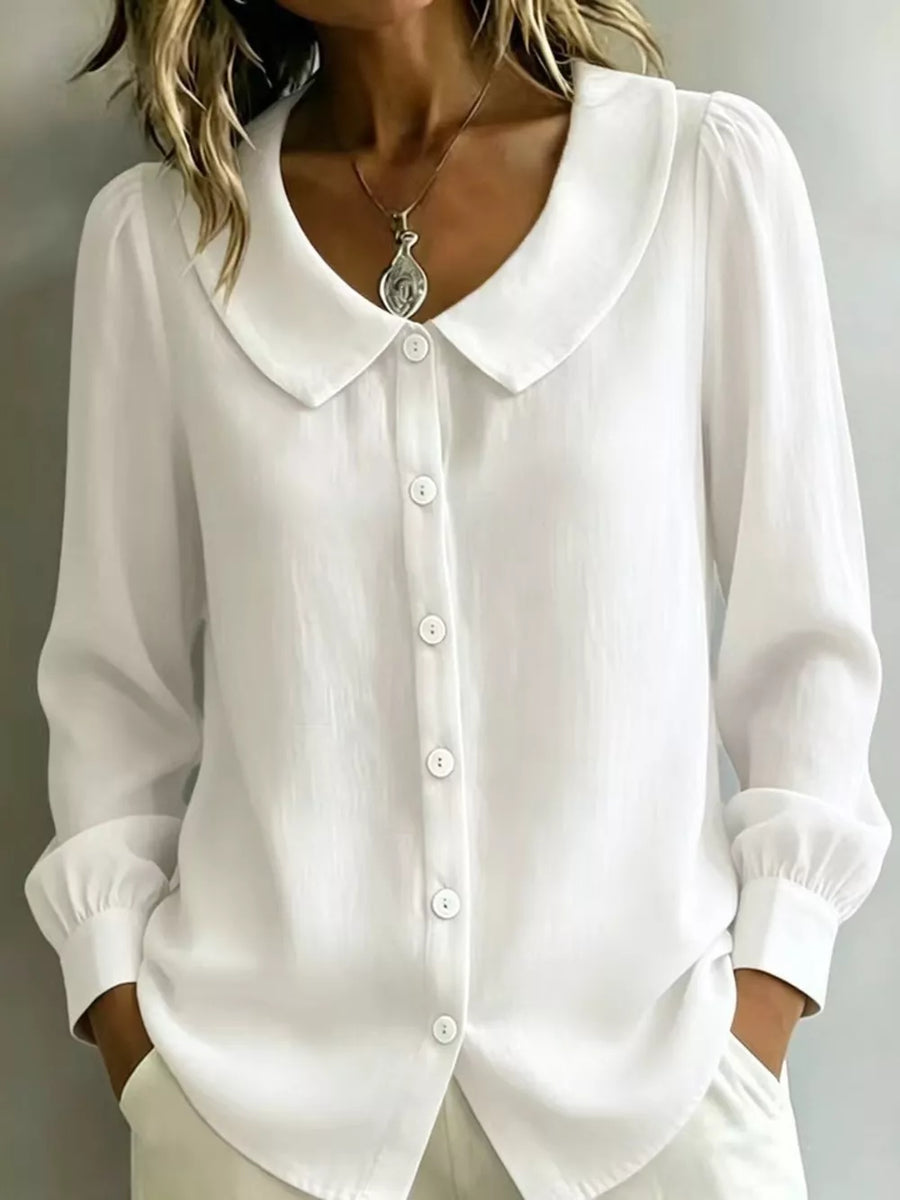 button-down shirt in white featuring buttoned and relaxed fit