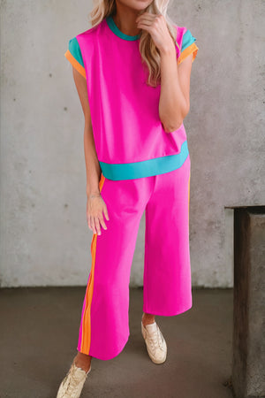 Colorblock sportswear set with contrast trim in Hot Pink and Black.