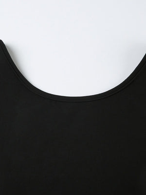 Black long-sleeve active romper with a boat neck and body-contouring fit.