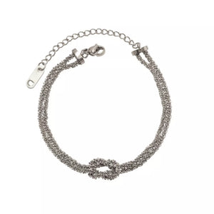 bracelet featuring twisted in silver with 18K Gold-Plated,Stainless Steel,Silver-plated Care instructions: Avoid wearing d