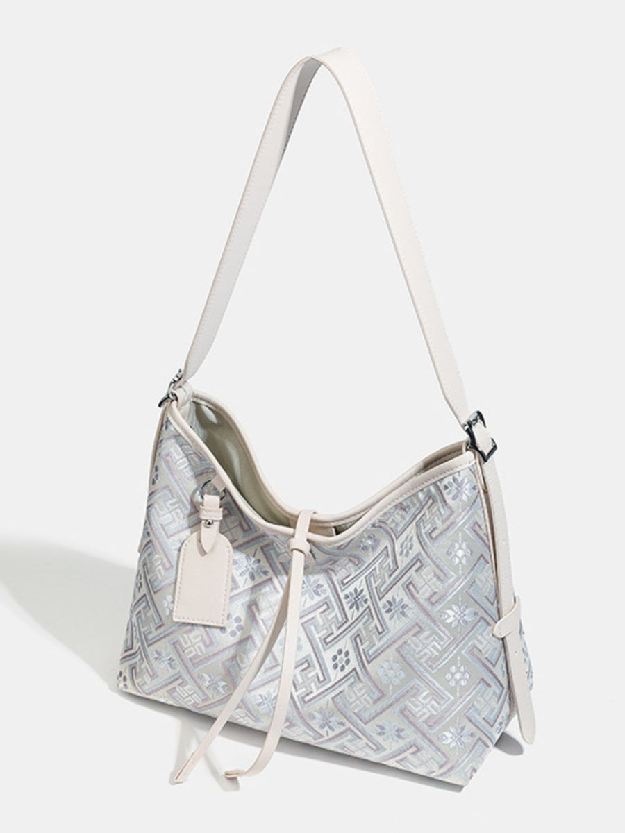 Light Blue handbag with medium and zip