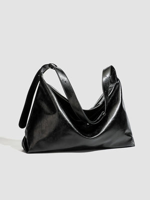 Minimalist Glossy Leather Slouchy Shoulder Bag in black with glossy finish