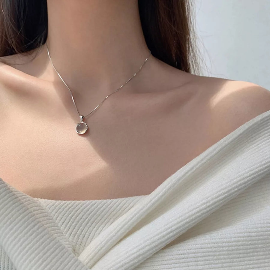 silver necklace with collarbone-length and clasp