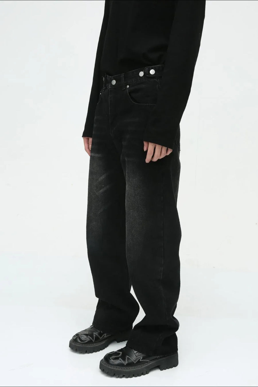 Relaxed fit denim jeans in dark vintage wash with button fly.