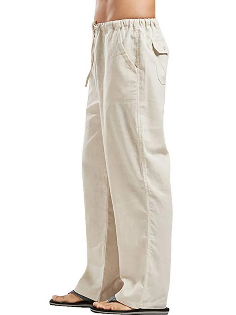 Relaxed fit linen drawstring trousers in Khaki with pockets and a straight leg.