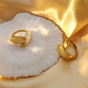 ring in gold featuring adjustable and bypass fit