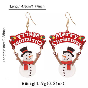 earrings in white with graphic and dangle