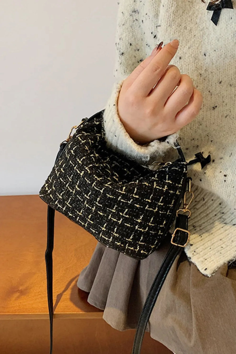 Black tweed box bag with gold hardware and detachable strap