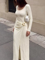 95% polyester, 5% elastane Care instructions: Machine wash cold midi dress in ivory with fitted silhouette