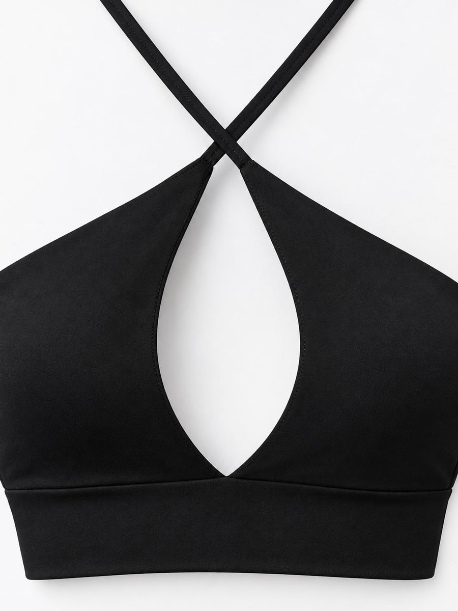 At least 95% polyester with spandex halter top in Fluorescent Orange with fitted silhouette