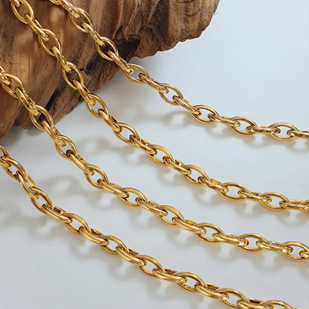 Chunky gold-tone oval link necklace with a bold, casual style.