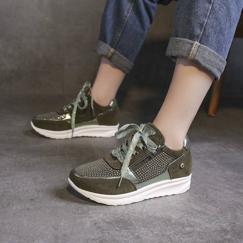 Khaki rhinestone embellished lace-up sneakers with a chunky sole and side zipper detail.