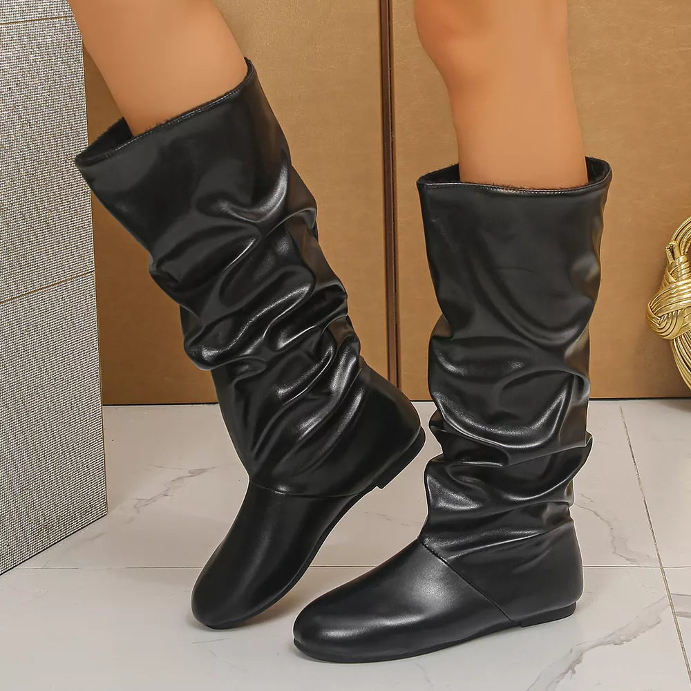 boots in black featuring slouchy shaft and slouchy fit