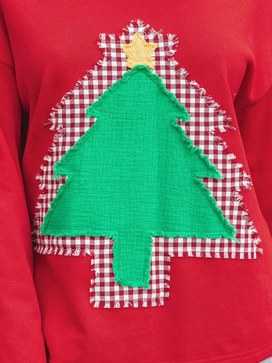 Red cotton sweatshirt with a green Christmas tree applique on red and white gingham.