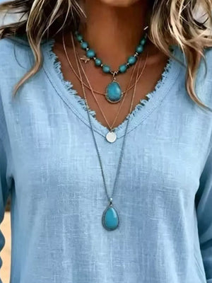 V-neck Frayed Hem Long Sleeve T-shirt in Light Blue with frayed hem