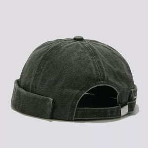 hat in dark olive featuring washed effect and fitted fit