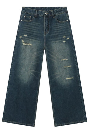 Distressed baggy dark wash denim jeans with a wide leg and whiskering details.