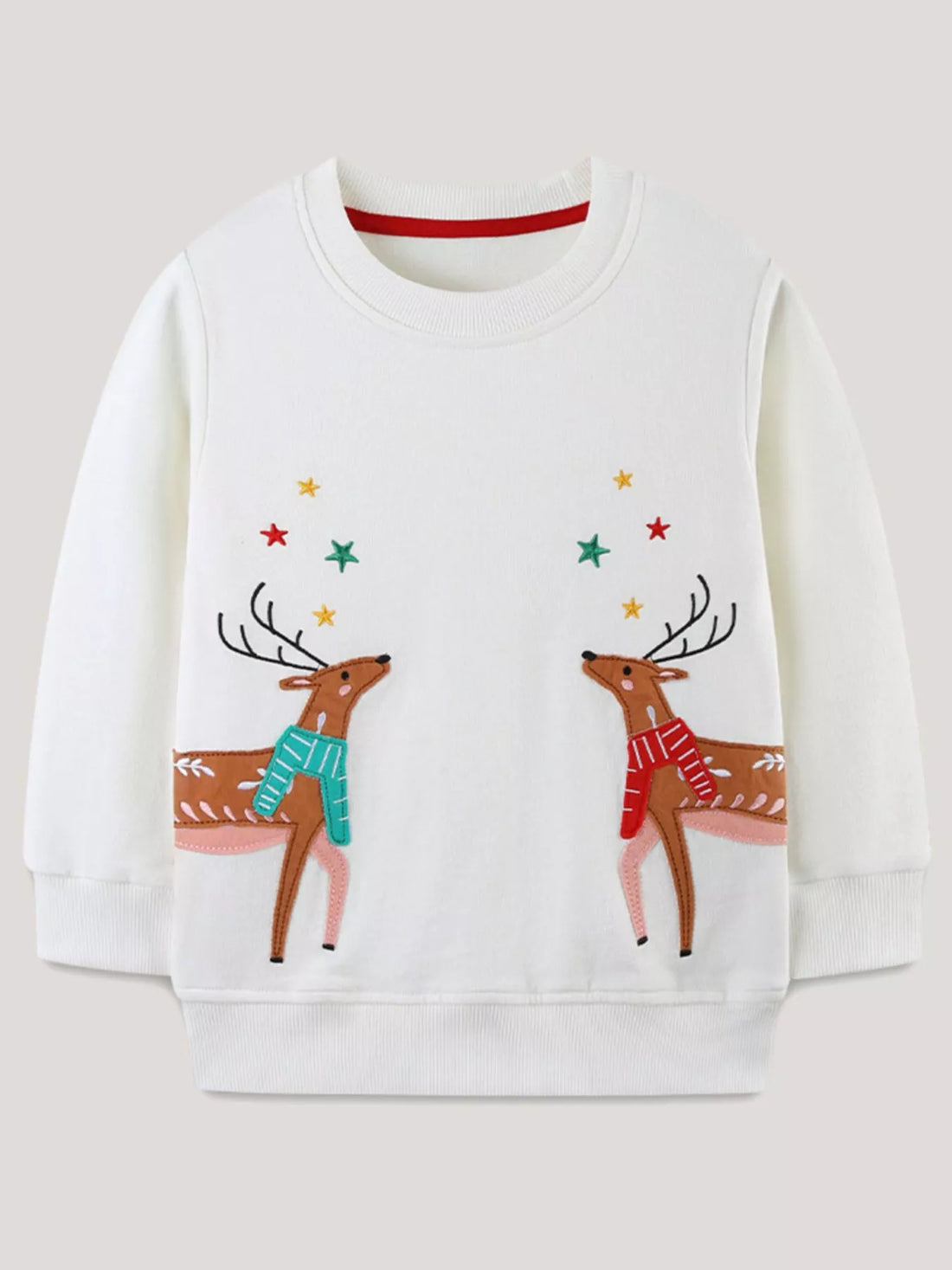 White cotton sweatshirt with embroidered reindeer and stars, red neckline trim.