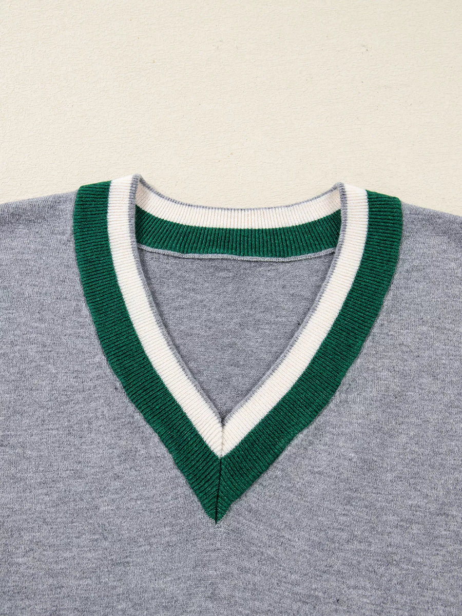 Gray ribbed V-neck sweater with green and white striped trim