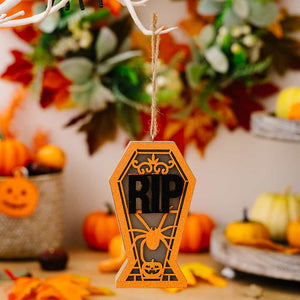 Orange coffin ornament with RIP, spider, and pumpkin cutouts, Style A