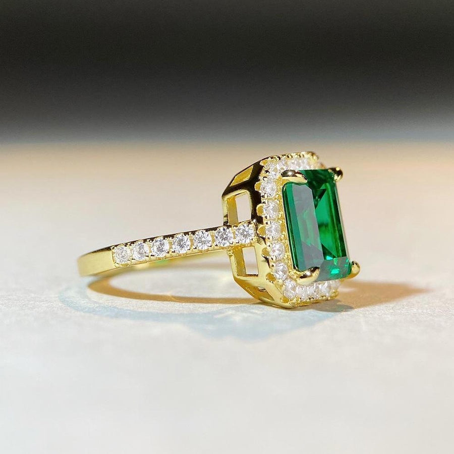 ring in gold with geometric and geometric stone