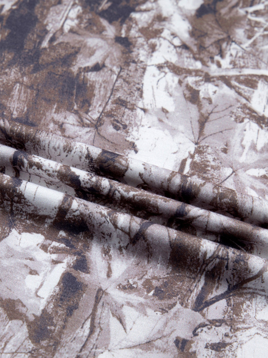 Woodland camouflage tunic with a crew neck and drop shoulder.
