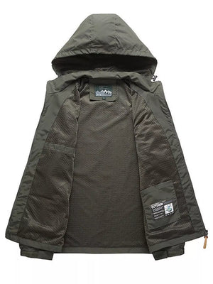 Green hooded windbreaker jacket interior with mesh lining and pockets.
