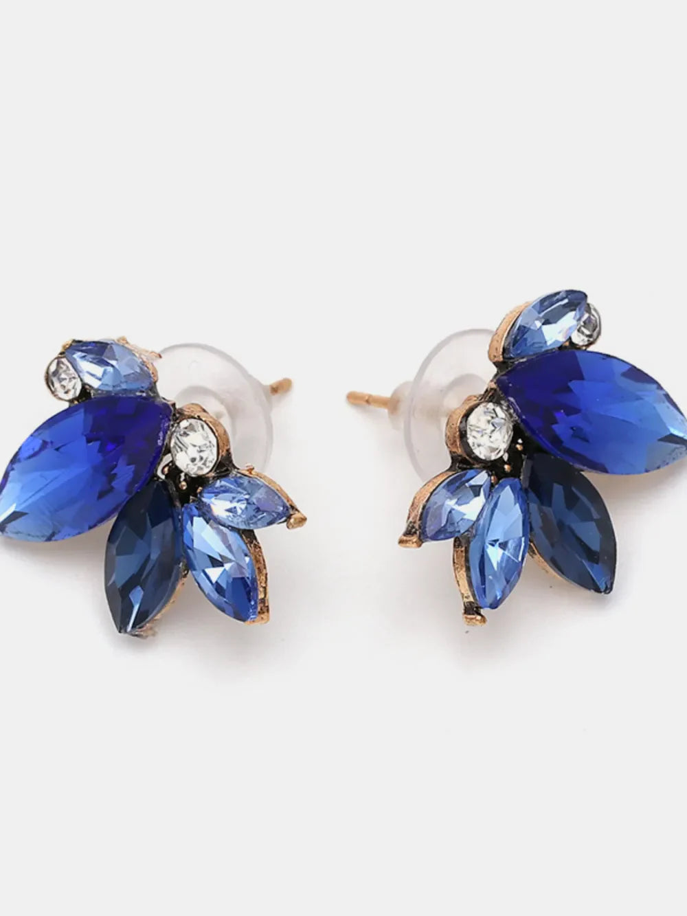 Gemstone petal cluster stud earrings in dark blue and light blue with antique gold alloy setting.