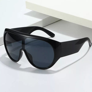 PC Frame material: Polycarbonate Lens material: Polycarbonate Temple material: P sunglasses in Brown with oversized