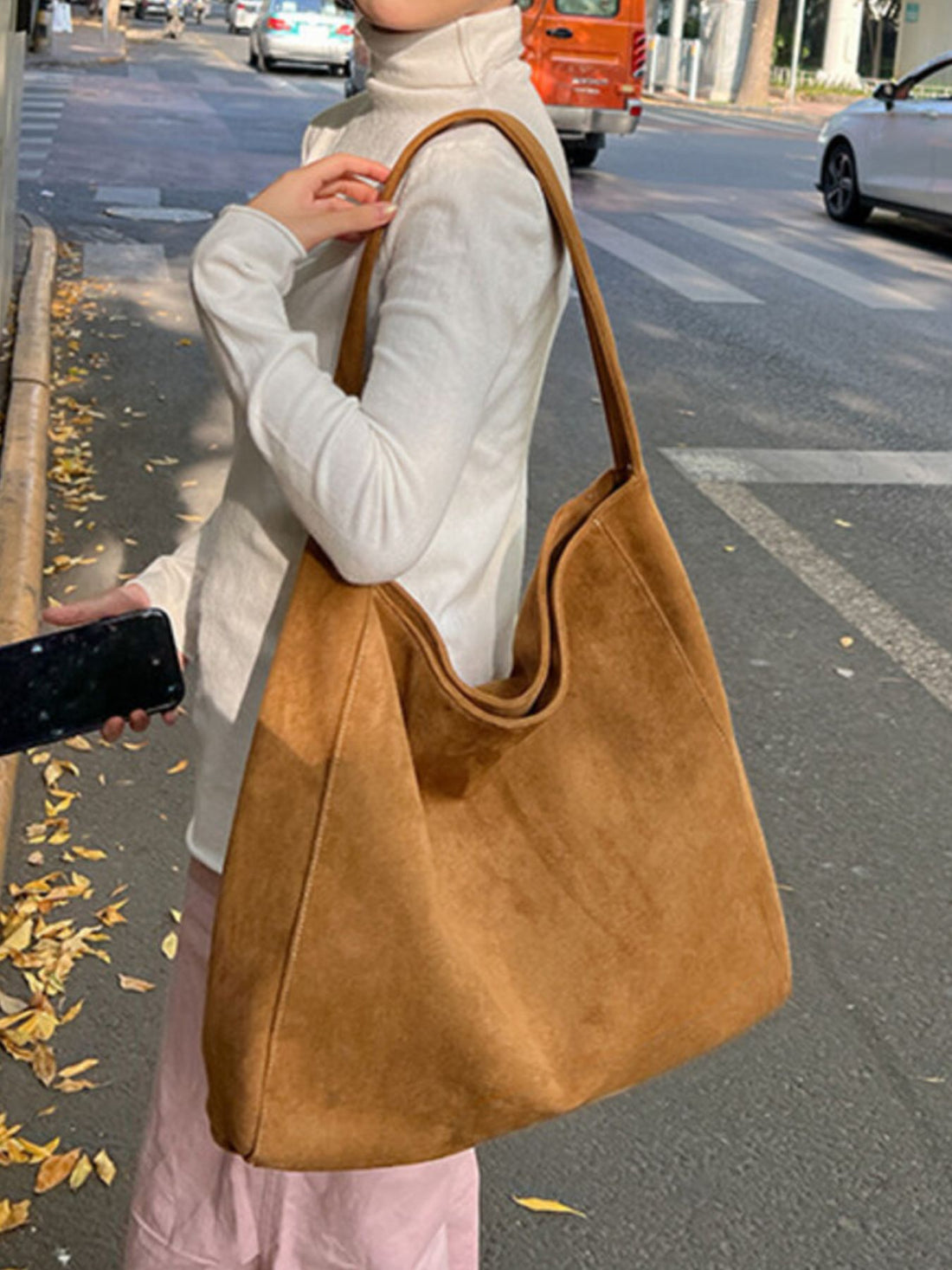 handbag in camel featuring single shoulder strap and relaxed fit