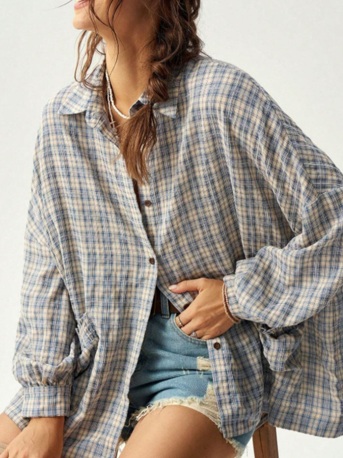 light blue button-down shirt with plaid and collared