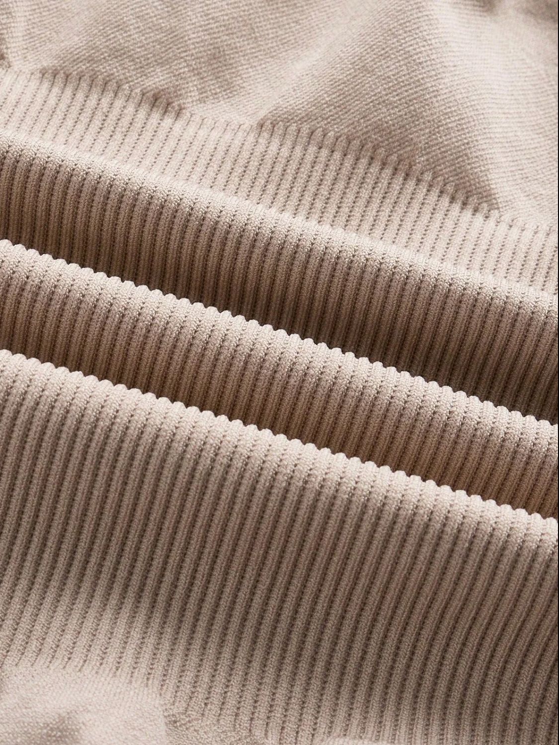 Ribbed contour shaping bodysuit in Dust Storm fabric with vertical ribbing detail.