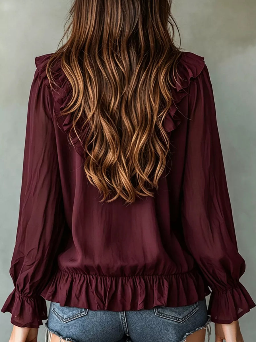 White relaxed blouse with v-neck