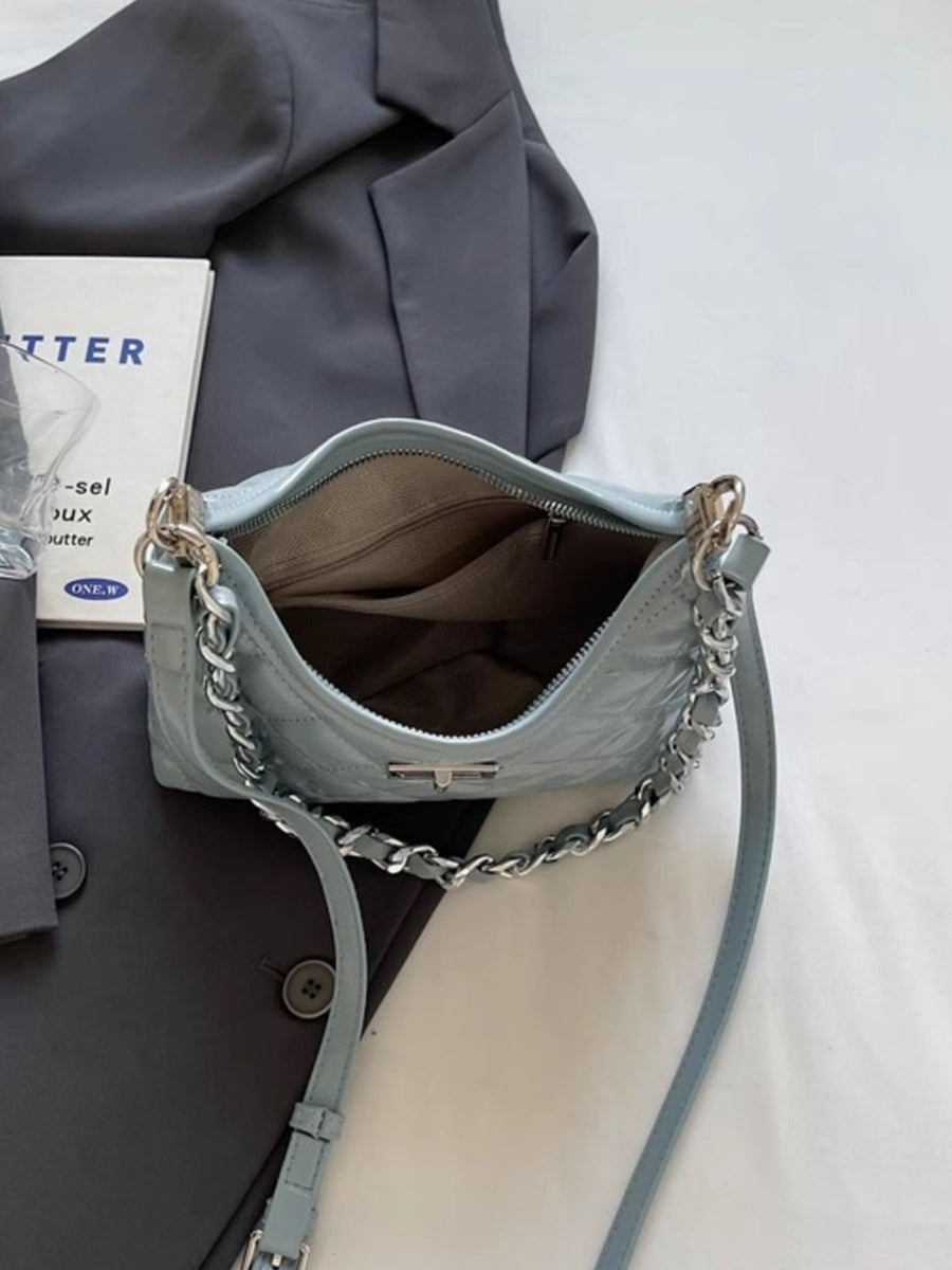 Blue quilted pu leather shoulder bag with silver chain strap detail