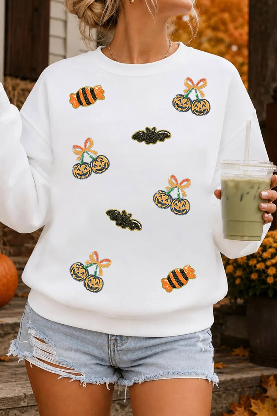 50% polyester, 50% cotton Care instructions: Machine wash cold pullover sweater in black with relaxed silhouette