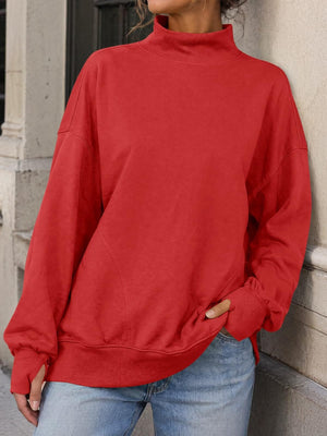 85% polyester, 15% spandex Care instructions: Machine wash cold sweatshirt in Red with oversized silhouette