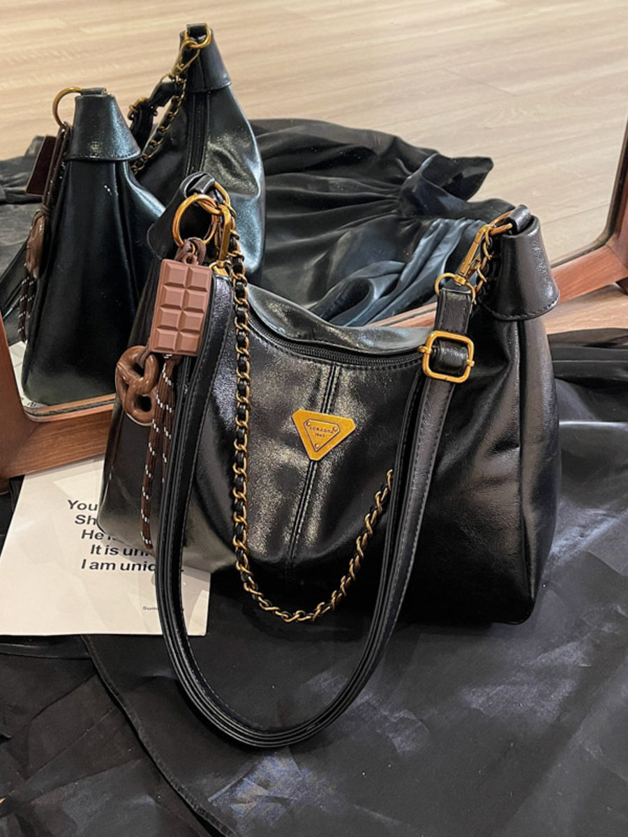 PU Leather Imported Size &amp crossbody bag in gold with slouchy silhouette