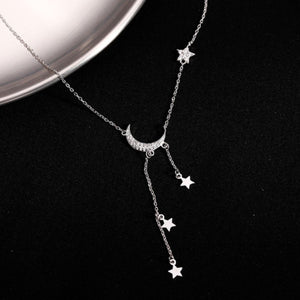 clear necklace featuring zircon embellishment and celestial
