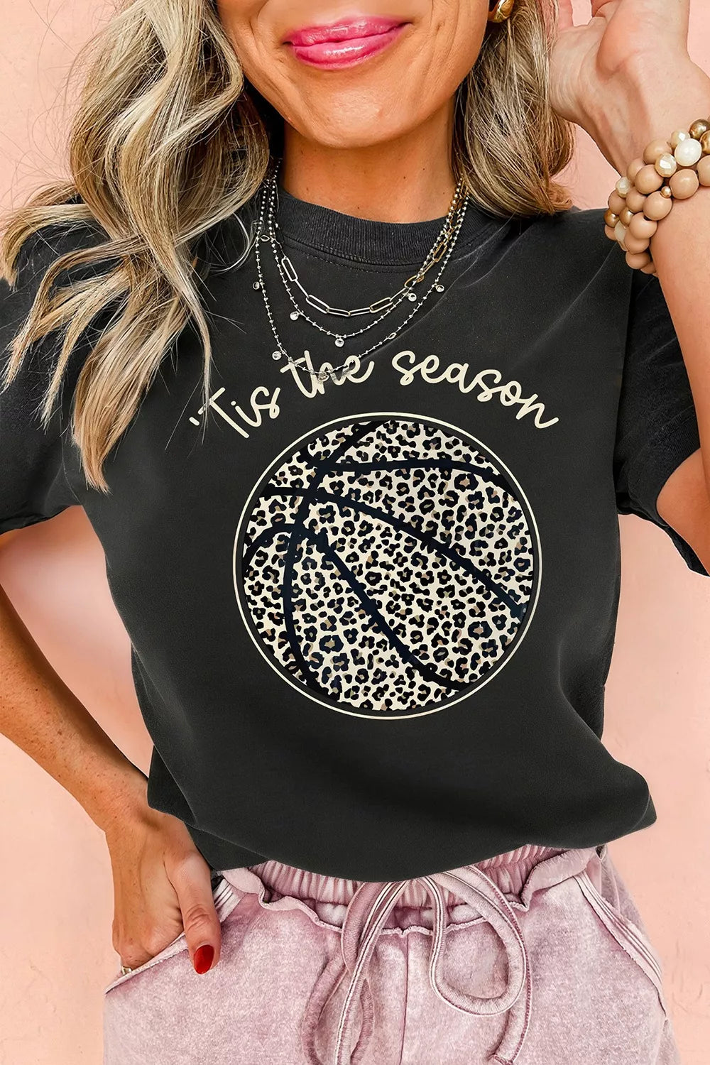 Black t-shirt with leopard print basketball graphic and text Tis the season