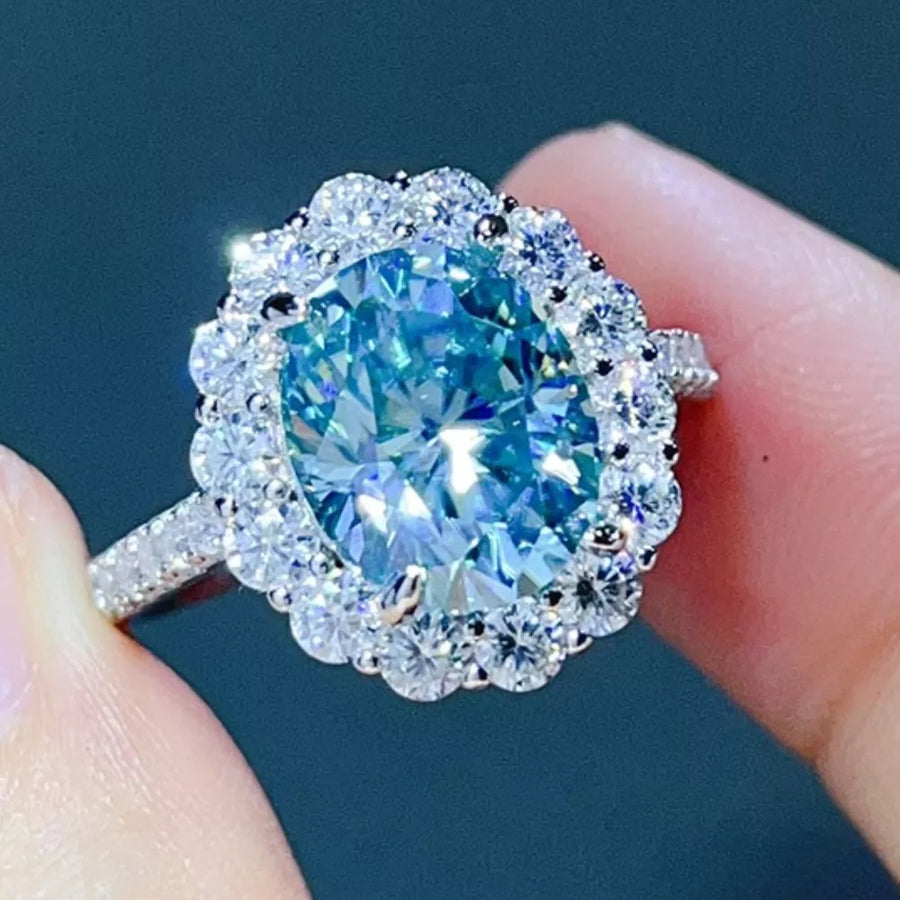 925 sterling silver,Moissanite Carat weight: 5ct Care instructions: Avoid wearin ring in Pastel Blue with oval silhouette