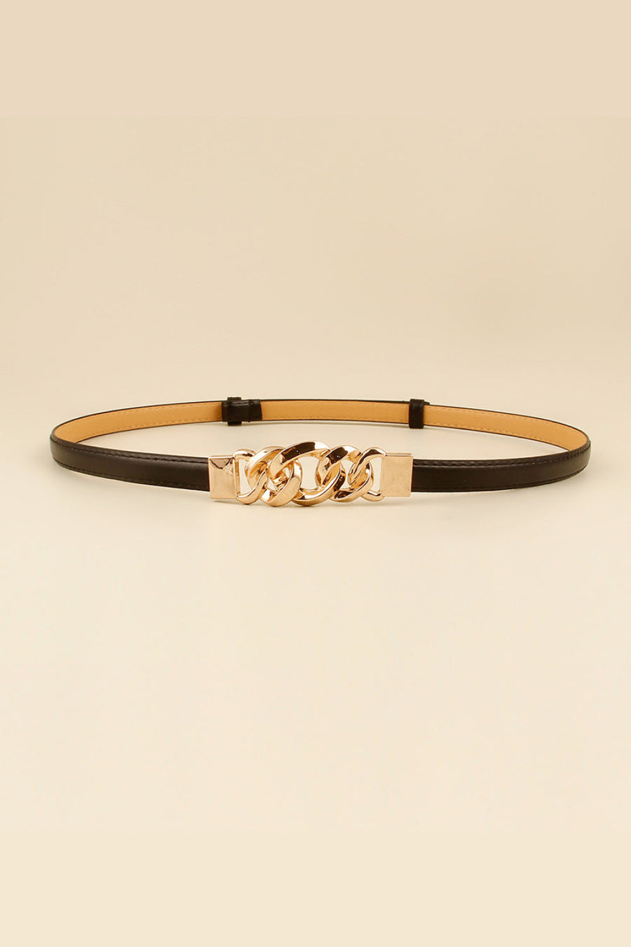 Black leather belt with gold chain link buckle detail